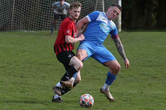 Duns Amateurs and Earlston Rhymers vying for the ball during the Dingers' 5-1 away win on Saturday to reclaim top spot in the Border Amateur Football Association's A division (Photo: Steve Cox)