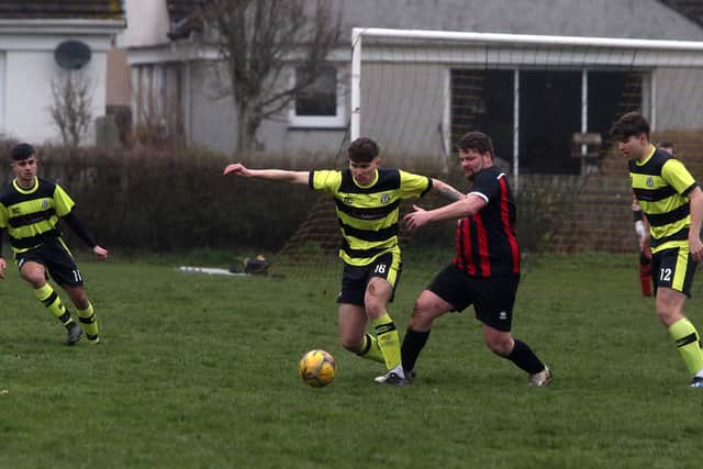 Stow's Ben McGregor and Hawick Colts' Aaron Swailes vying for the ball on Saturday (Pic: Steve Cox)