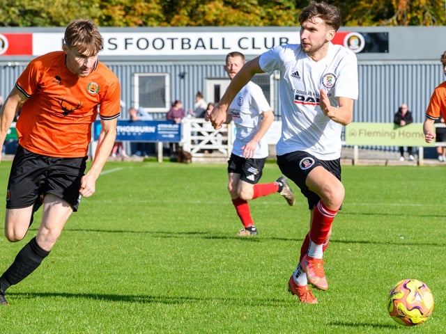 Kieran Burns in action for Duns Amateurs as they beat Hawick United 9-1 at home in round one of this football season’s Waddell Cup on Saturday (Photo: Alan Raeburn)