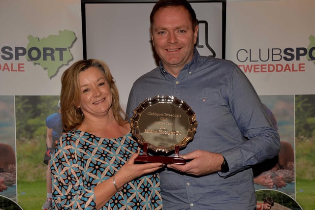 Linton Hotspur chairman Campbell Forsyth being given their accolade for club of the year by Tweeddale West councillor Viv Thomson at ClubSport Tweeddale's 2023 award ceremony, held at Peebles Rugby Club