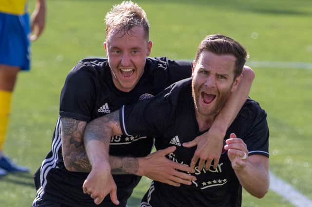 Ross Aitchison celebrates with Daryl Healy after scoring Gala Fairydean Rovers' winner against Cumbernauld Colts at Broadwood Stadium (Photo: Thomas Brown)