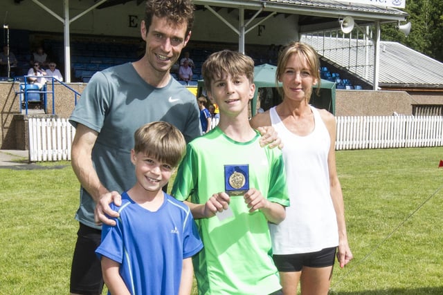 Kelso's Oliver Hastie celebrating winning the 1,500m youth handicap with his family