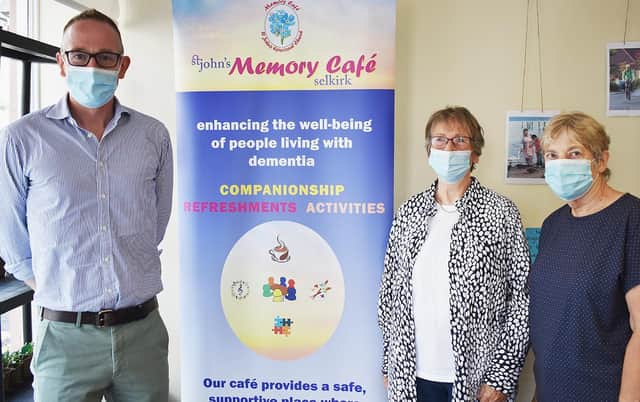 Borders MP John Lamont pictured in Selkirk on Friday with Memory Café organisers Chris Sharpe and Helen Sceats. Photo: John Smail.