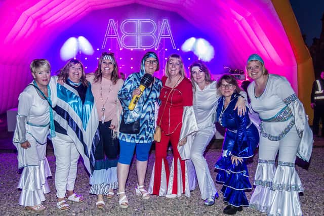 Jedburgh ladies out for 21st Century Abba at Floors Castle. (Photo: BILL McBURNIE)
