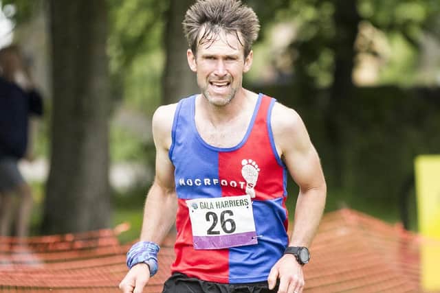 Moorfoot Runners' Andy Cox won this year's Eildon Three-Hill Race in a time of 40:18, with Glasgow's Iain Stewart second and Haddington's Brian Marshall third