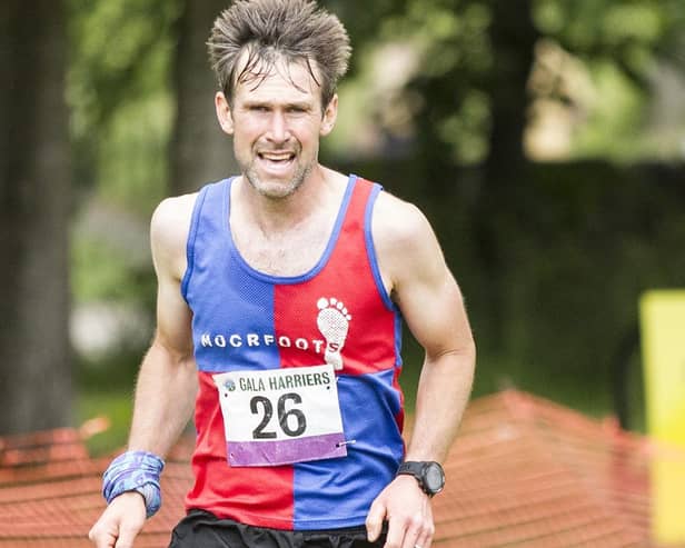 Moorfoot Runners' Andy Cox won this year's Eildon Three-Hill Race in a time of 40:18, with Glasgow's Iain Stewart second and Haddington's Brian Marshall third