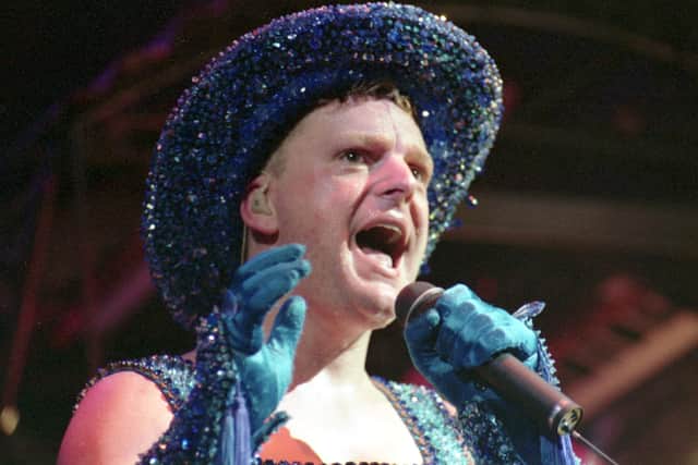 Erasure frontman Andy Bell wearing his sparkly blue 'Rhinestone Cowboy' outfit on stage at the Playhouse theatre in Edinburgh, June 1992.
