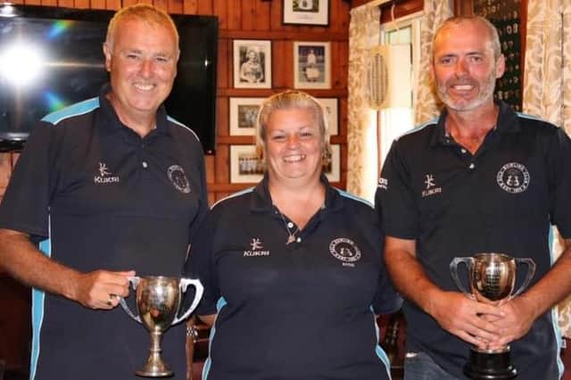 Tully Cup winners Robert Fox and James Charters are pictured with Gala club president Roseanne Eades