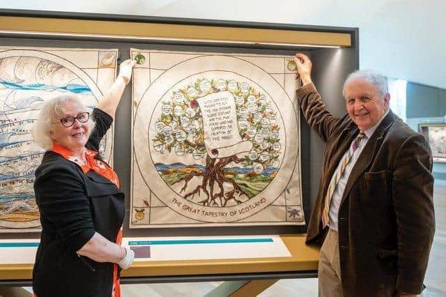 Stitcher co-ordinator Dorie Wilkie with author Alexander McCall at August's opening. (Photo: Phil Wilkinson)