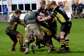 David Colvine being tackled during Hawick's 20-7 Border League win at home to Melrose on Friday (Photo: Alwyn Johnston)