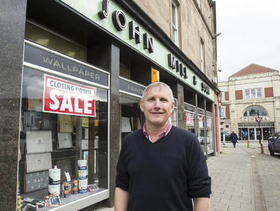 David Mill outside his family business, which is closing its doors. Photo: Bill McBurnie.