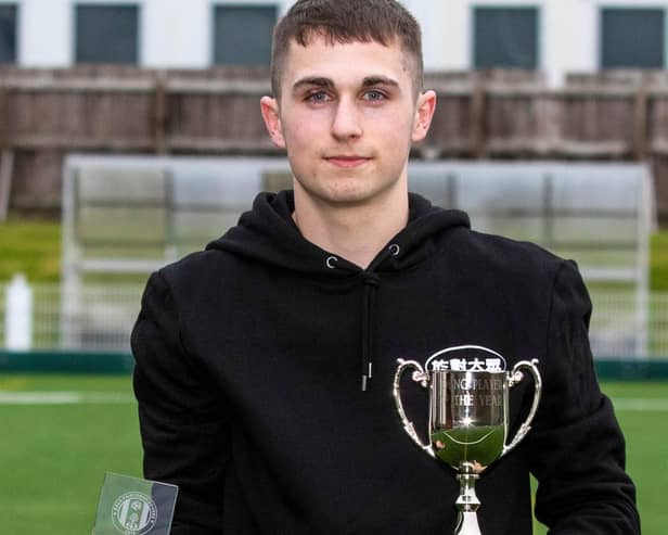 Defender Quinn Mitchell with his Gala Fairydean Rovers young player of the year award in April (Pic: Thomas Brown)