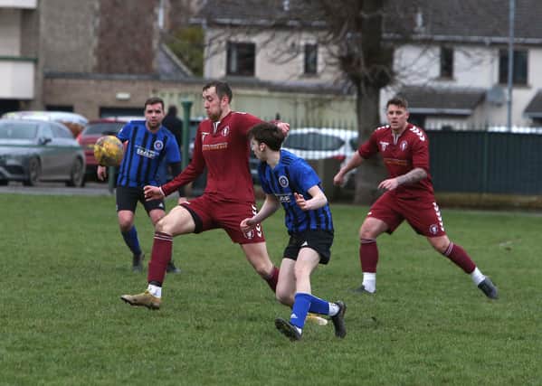 Langlee Amateurs' Lewis Swaney on the attack against Duns Amateurs at Galashiels Public Park during their South of Scotland Amateur Cup last-eight tie earlier in the year (Pic: Steve Cox)