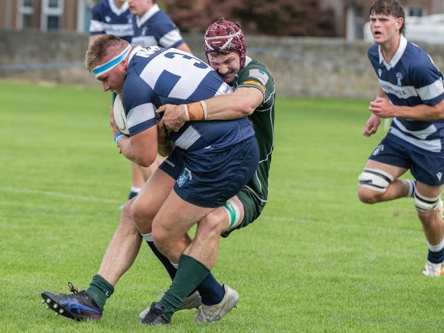Jack Henry making a tackle for Hawick, on Euan McLaren, during their 80-13 loss away to Heriot’s in Edinburgh on Saturday (Photo: Jonathan Cruickshank)