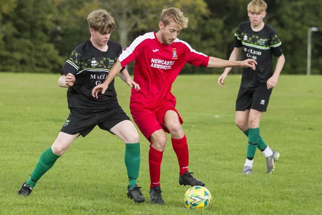 Calder Law challenging for possession for Hawick Legion versus Coldstream Amateurs at the weekend (Pic: Bill McBurnie)