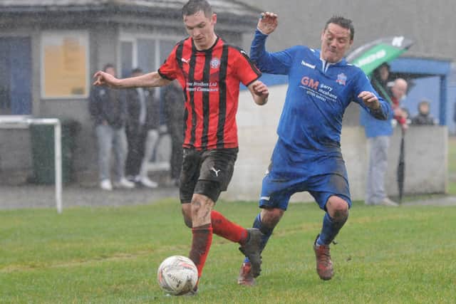 Craig Lowrie trying to get a tackle in for Selkirk Victoria against Biggar United on Saturday (Pic: Grant Kinghorn)