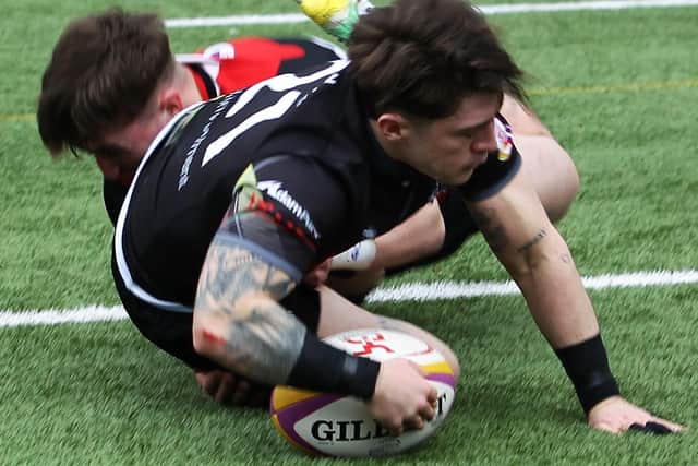 Rory Brand touching down for Southern Knights versus Stirling Wolves on Saturday in Melrose (Pic: Douglas Hardie)