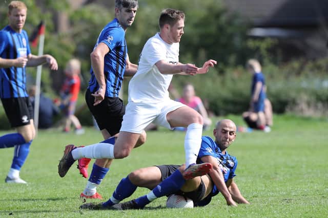 Duns Amateurs getting a tackle in against Newtown on Saturday (Photo: Brian Sutherland)