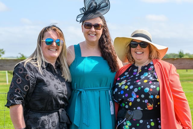 Three race-goers at Kelso's ladies' day season finale on Sunday