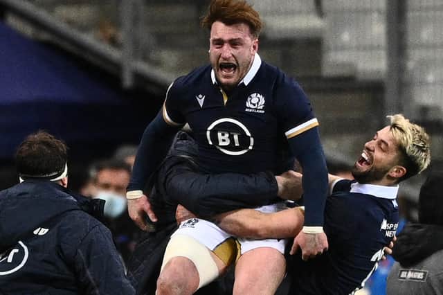 Scotland full-back Stuart Hogg celebrates with team-mates after Scotland's win against France last night (Photo by Anne-Christine Poujoulat/AFP via Getty Images)
