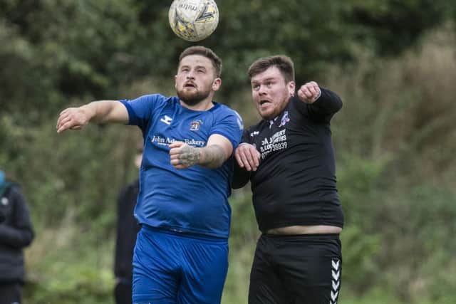 Liam Rutherford putting in an aerial challenge for Leithen Rovers against Selkirk Victoria during Saturday's Wright Cup final defeat (Pic: Bill McBurnie)