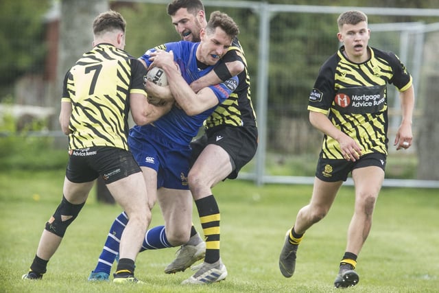 Jed-Forest's Lewis Young in action against Melrose in the semi-finals at Earlston Sevens