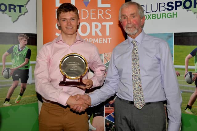 Kelso's Oscar Onley being given a ClubSport Roxburgh special award last year by Trevor Bryant in Jedburgh