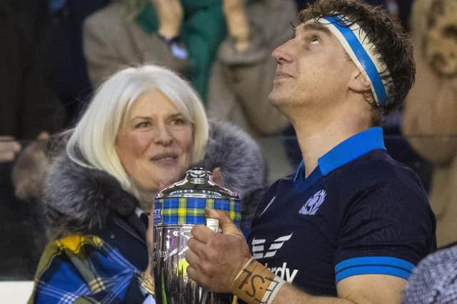 Scotland rugby captain Jamie Ritchie being presented with the Doddie Weir Cup by the late Melrose lock's widow Kathy after beating Wales 35-7 at Murrayfield Stadium in Edinburgh on Saturday (Pic: Ross MacDonald/SNS Group/SRU)