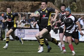 Struan Hutchison in possession for Melrose during their 45-0 first-round win against Kelso at his club's 2023 sevens (Photo: Rob Gray)