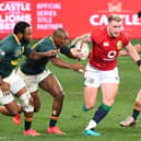 British and Irish Lions full-back Stuart Hogg on the ball against South Africa in Cape Town yesterday (Photo by Rodger Bosch/AFP via Getty Images)