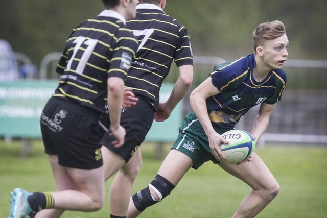 Charlie Comley playing for Hawick Youth against Melrose Wasps at Jed Thistle's sevens tournament