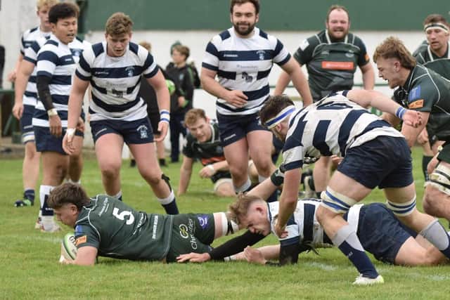 Connor Sutherland scoring a try for Hawick during their 45-33 win at home to Heriot's Blues at Mansfield Park on Saturday (Photo: Malcolm Grant)