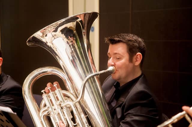 Tuba player Les McNeish.