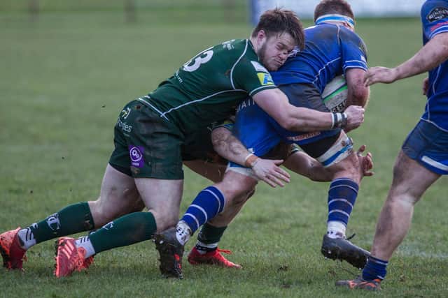 Hawick's Andrew Mitchell tackling Jed-Forest's Ben McNeill (Photo: Bill McBurnie)