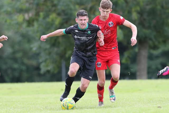 Hawick Legion's Mark Long, right, challenging for possession against Greenlaw on Saturday (Pic: Brian Sutherland)