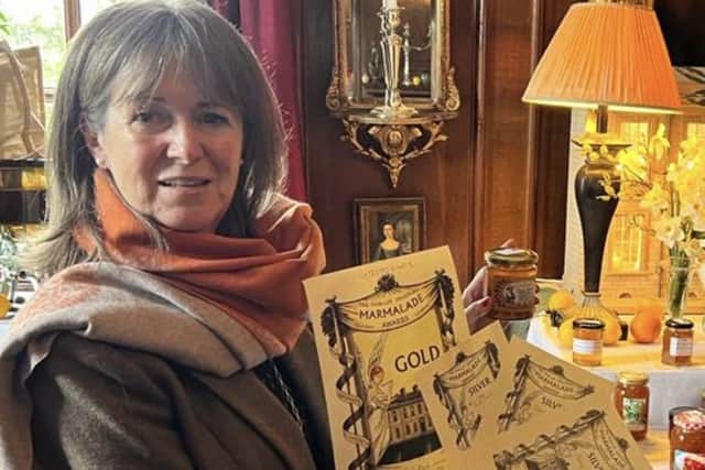 Ena Mitchell of Selkirk with the awards for her marmalade.