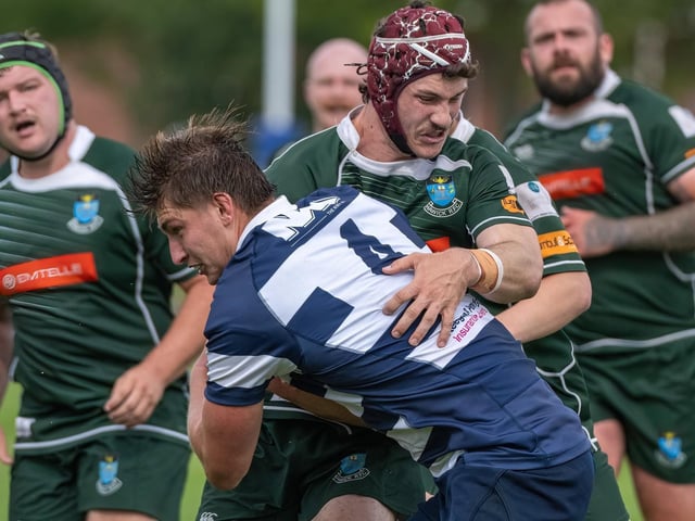 Jack Henry making a tackle for Hawick, on Patrick Spence, during their 80-13 loss away to Heriot’s in Edinburgh on Saturday (Photo: Jonathan Cruickshank)