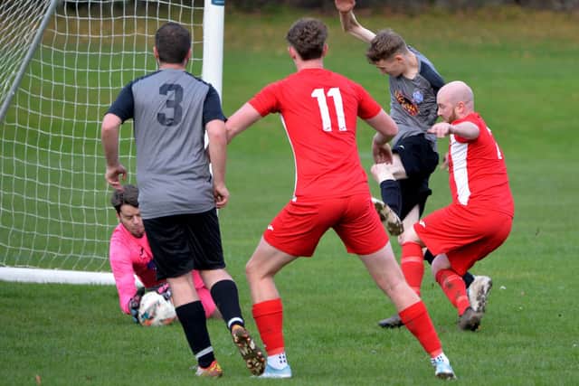 Kelso Thistle's Luke McKinlay and Jamie Milner putting pressure on Selkirk's goal on Saturday (Photo: Alwyn Johnston)