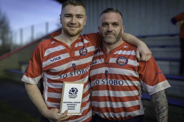 Hat-trick heroes David Collins and, right, Neil Hogarth celebrating after Peebles beat Aberdeen Grammar 67-14 away on Saturday to secure rugby's Scottish National League Division 2 title (Photo: Stephen Mathison)