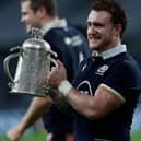 Scotland full-back and captain Stuart Hogg holds the Calcutta Cup after the Six Nations rugby union match between England and Scotland at Twickenham Stadium in south west London today. (Photo by Adrian Dennis/AFP via Getty Images)