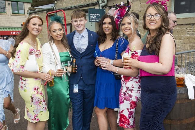 Six of the thousands of spectators at 2022's Kelso Races' ladies' day