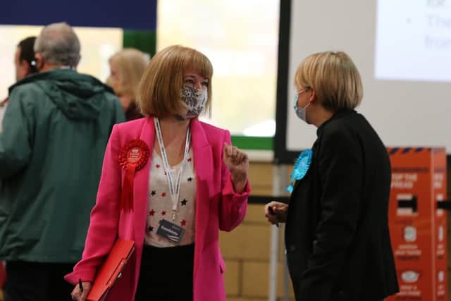 Labour's Katherine Sangster and Conservative Shona Haslam share a chat at the count.