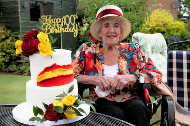 Ana Maria Dodds with her centenary birthday cake.