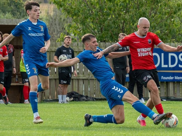 Thomas Hume on defensive duty for Coldstream during their 4-4 draw at home to Kirkcaldy and Dysart on Saturday (Photo: Julie Russell)