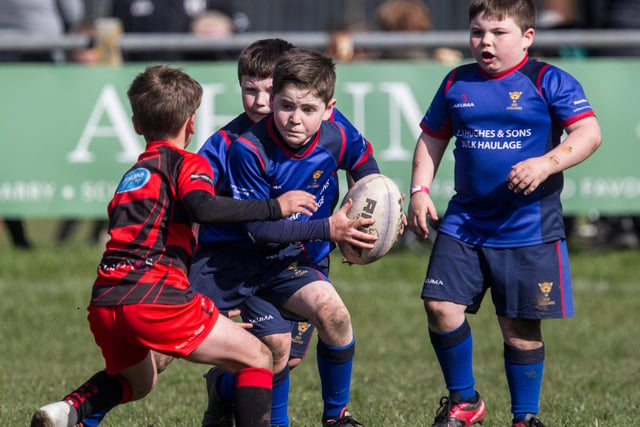 Scott Turnbull on the ball for Jed Jaguars at Kelso Cougars' mini-rugby tournament at the weekend