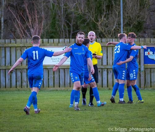 Ross Aitchison celebrates goal by number 23 Thomas Grey (Pic Corine Briggs)