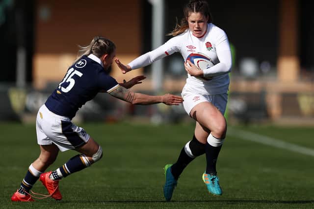 Jess Breach holds off Jedburgh's Chloe Rollie during the Women's Six Nations match between England and Scotland at Castle Park on April 3, 2021,  in Doncaster (Photo by Jan Kruger/Getty Images)