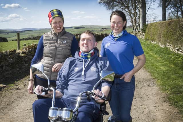 Alice Gully and Kate Mactaggart with Doddie Weir. Pic: Bill McBurnie Photography