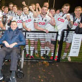Blainslie's Doddie Weir congratulating Southern Knights players on winning his club trophy at the Greenyards