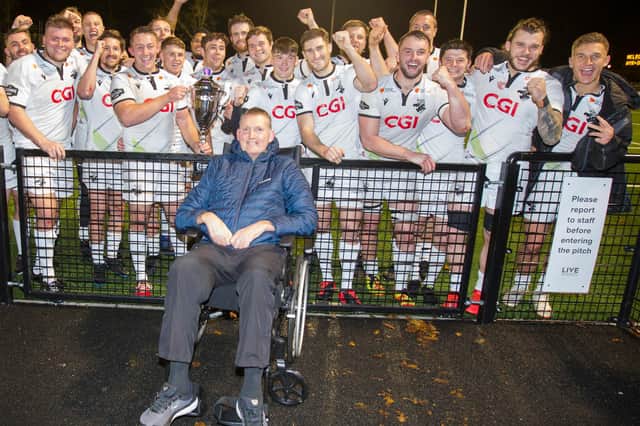 Blainslie's Doddie Weir congratulating Southern Knights players on winning his club trophy at the Greenyards